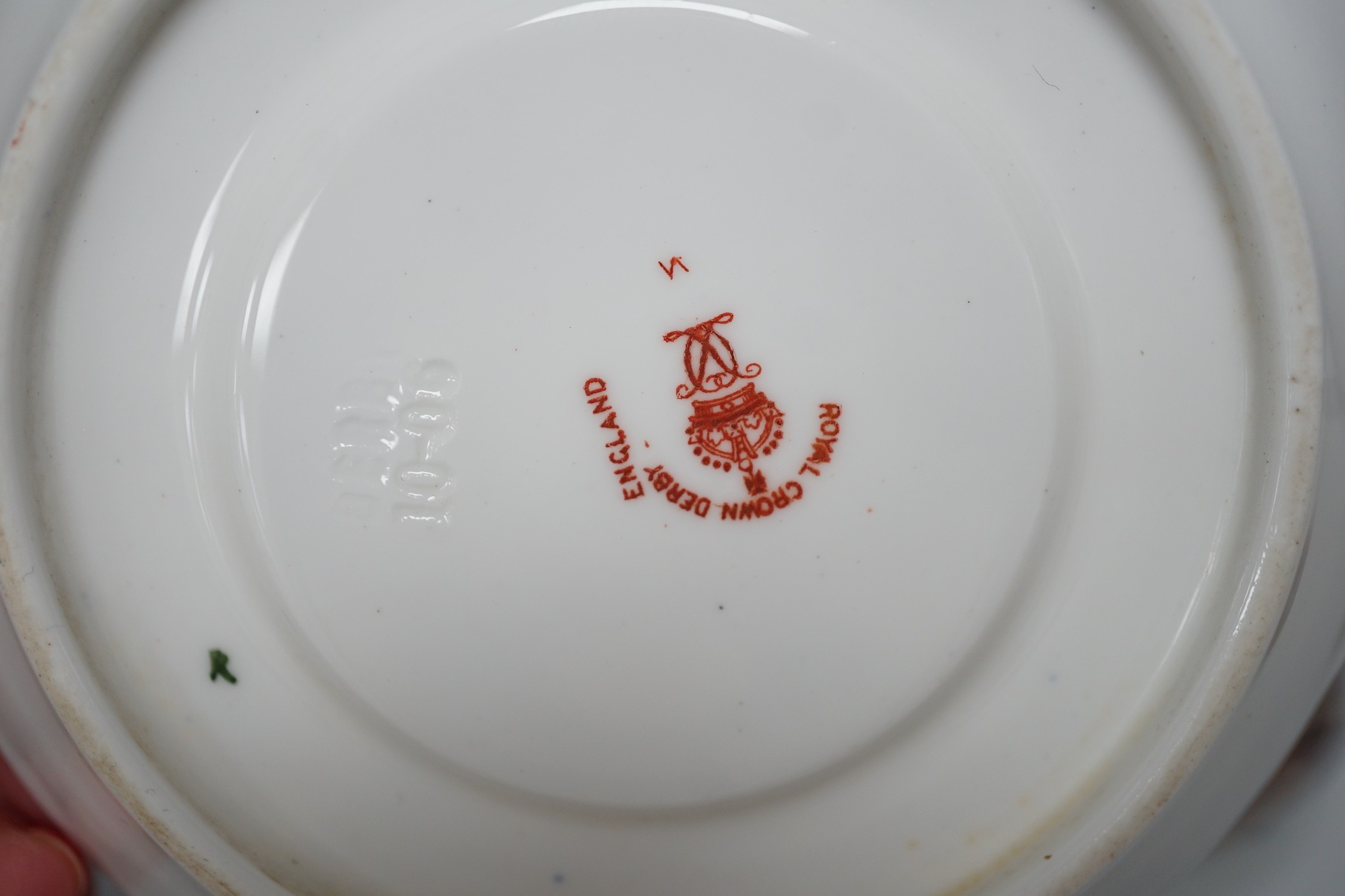 Five Royal Crown Derby Imari coffee cans and saucers
